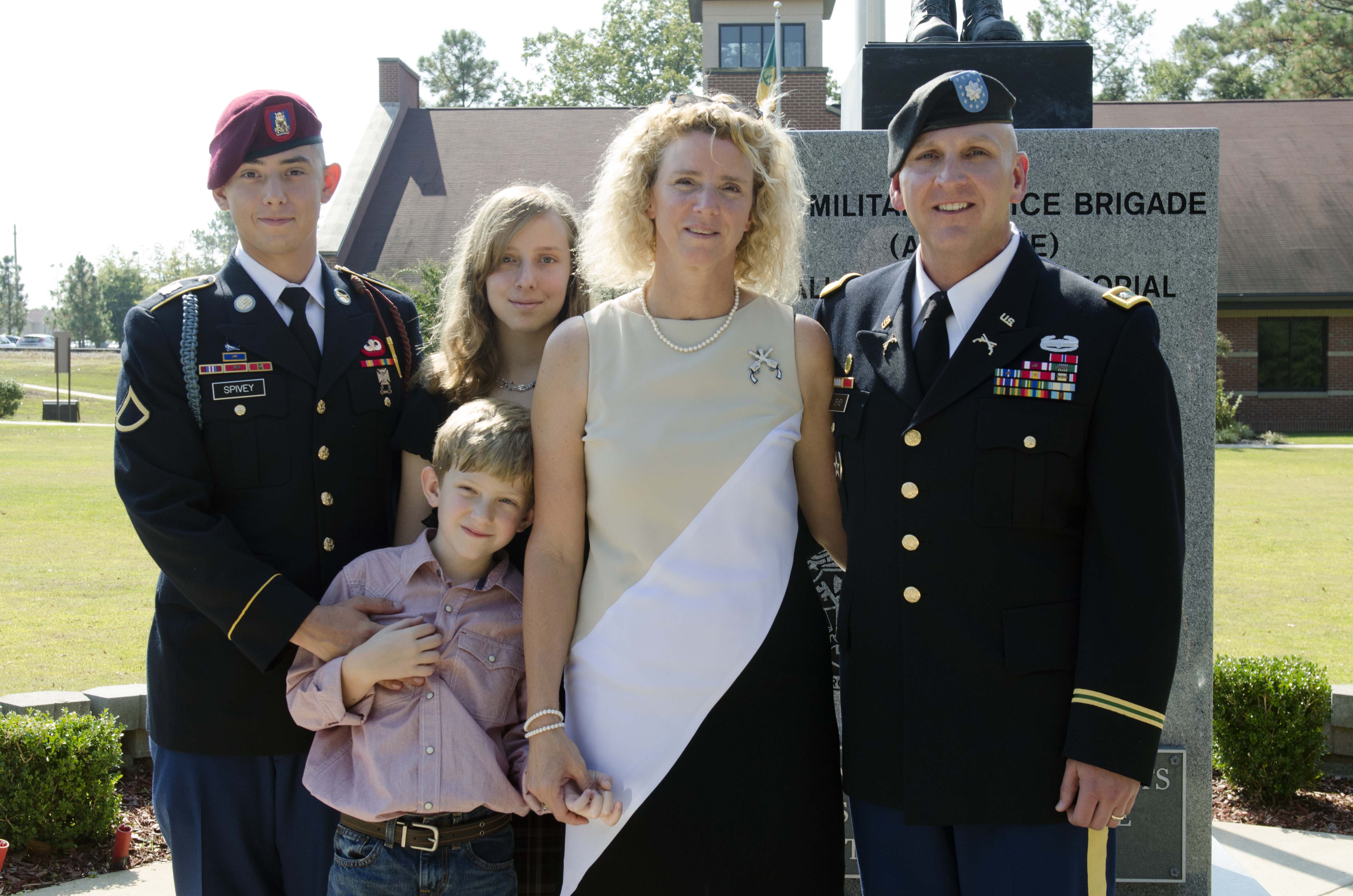 The Spivey family in dress uniform at a promotion ceremony, November 2014