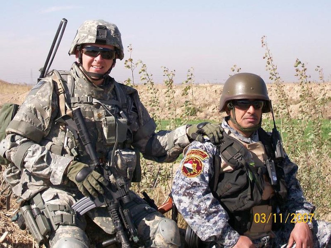 Then-Major Spivey with an Iraqi National Police officer on a dismounted patrol near the Tigris, southwest of Baghdad, 2007